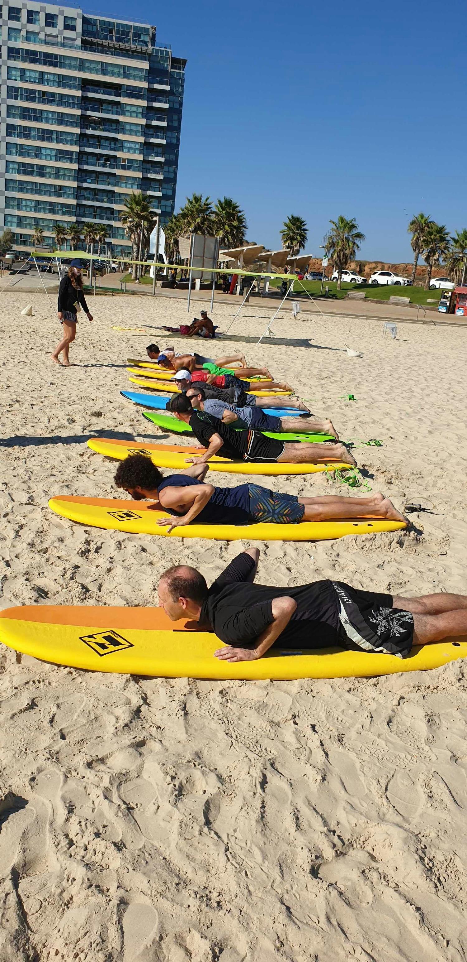 CB4's Israel team took group surfing lessons together