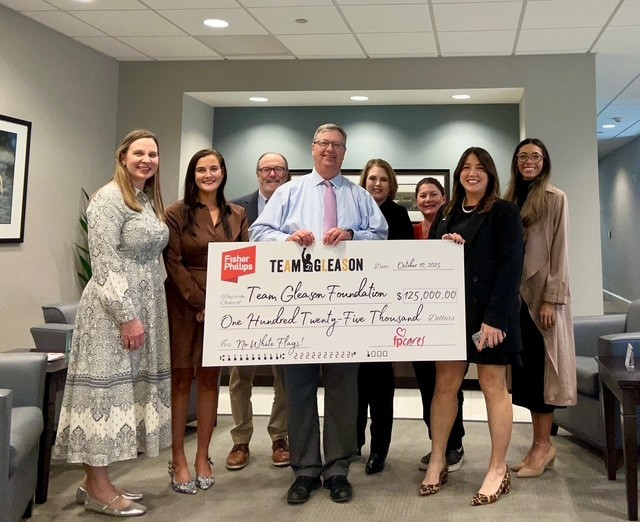 The New Orleans office presented a check to the Gleason Foundation, funded by firmwide partner donations.