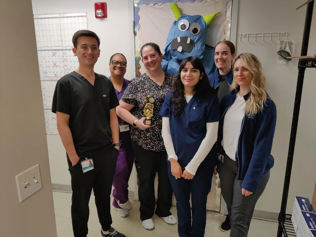 Axia colleagues celebrate Lab Professionals Week with a door decoration contest