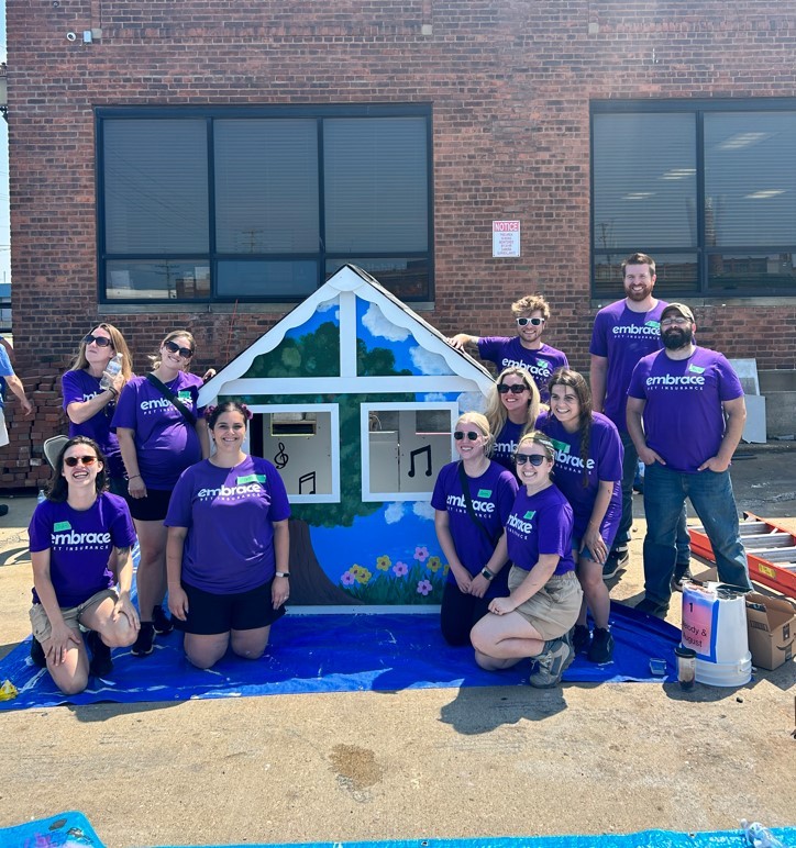 The Marketing and Infrastructure Teams volunteered to build and decorate playhouses at Habitat for Humanity.