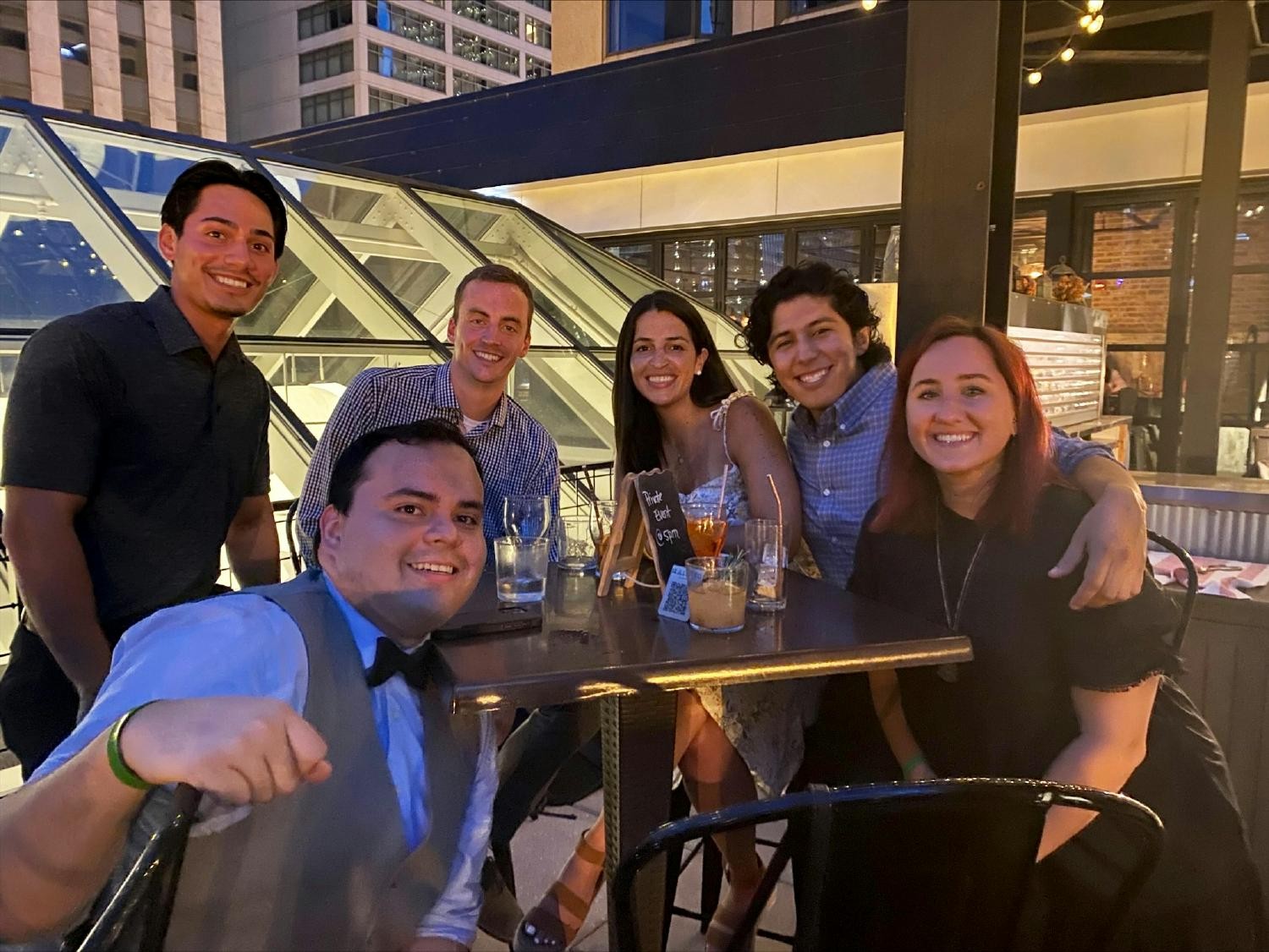 Some of Credico’s Client Services and Finance teams mingle at our annual rooftop NAMJAM. 