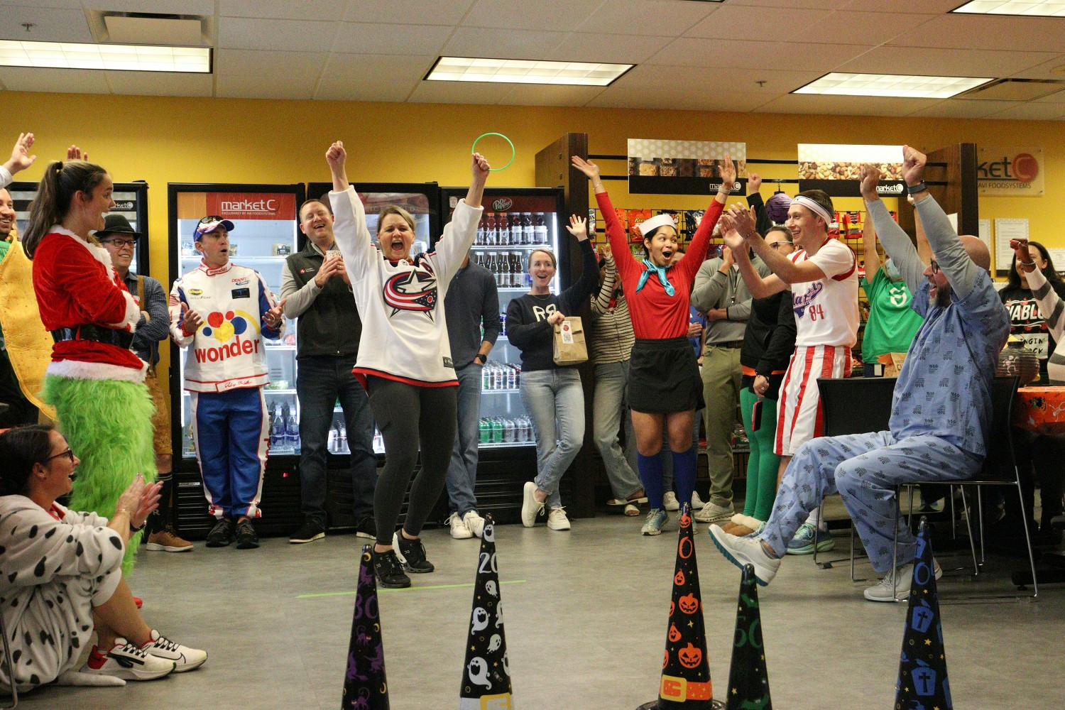 Team members enjoying a very exciting game during our Halloween employee engagement event.
