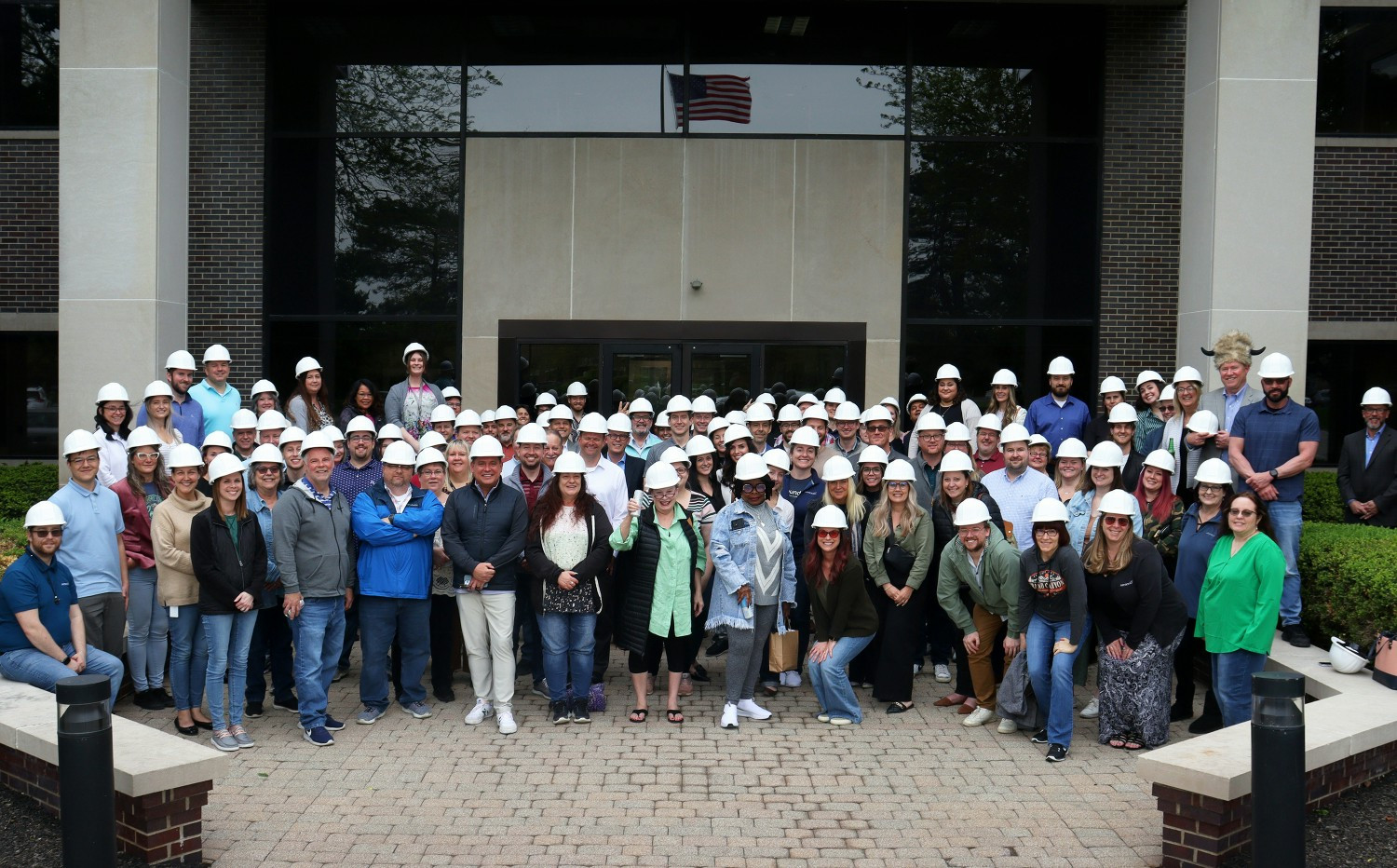 Sarnova team members celebrating the purchase of our new corporate headquarters in April 2024.