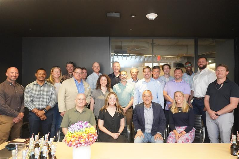 Employees coming together in our new office.