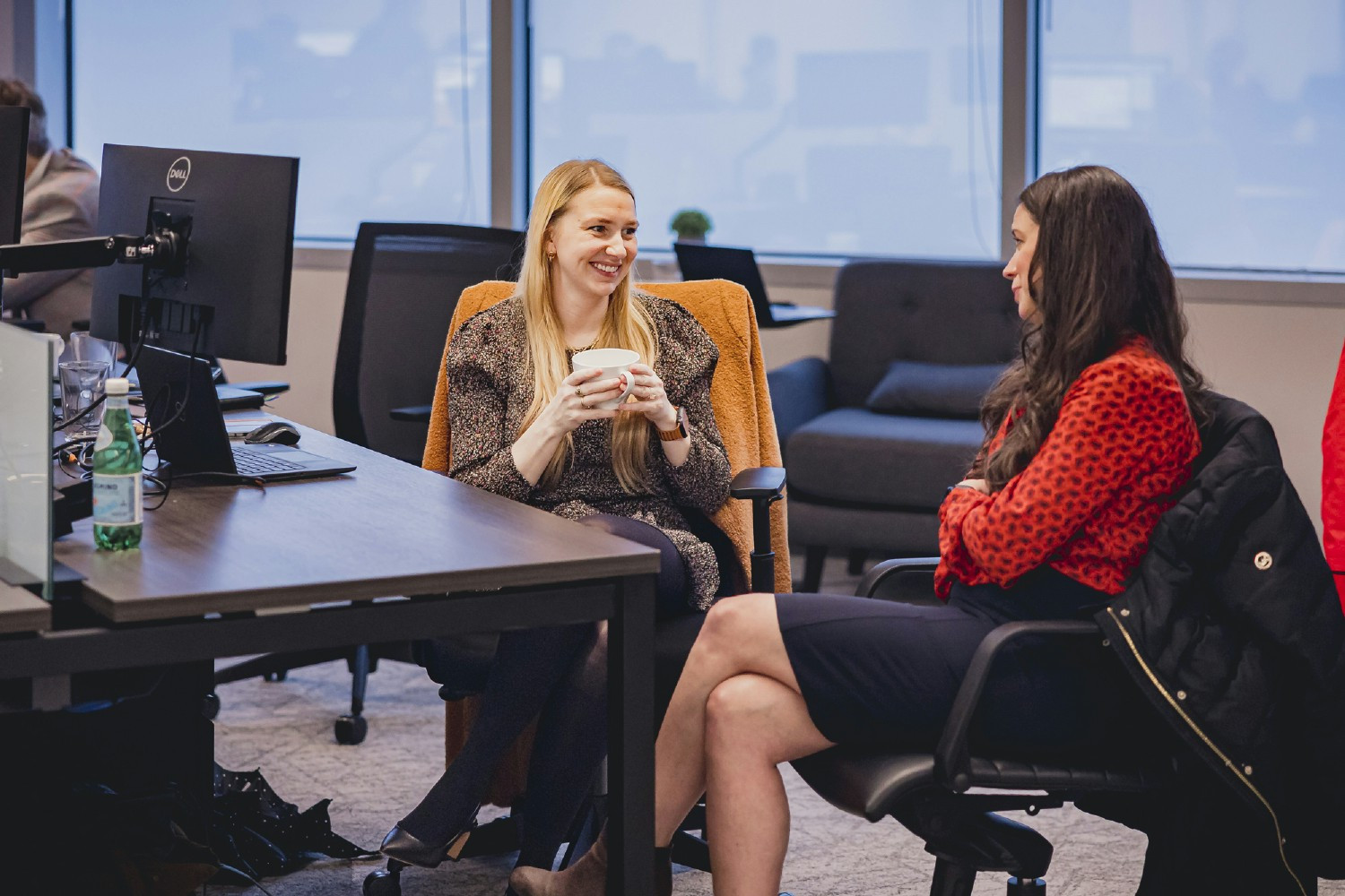 Two of our Proxima US leaders conversing in the Chicago, IL office.