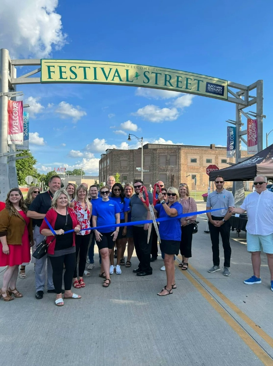 Ribbon cutting ceremony to celebrate our sponsorship of Janesville's revitalized downtown and Festival Street.
