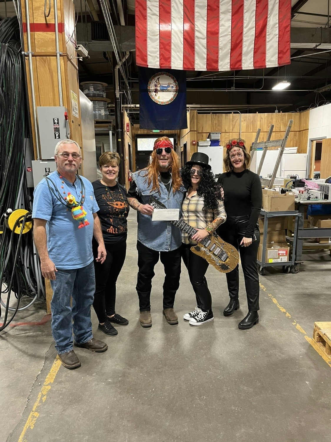 Annual Halloween Costume Contest winners.  Guns N' Roses were awarded a 