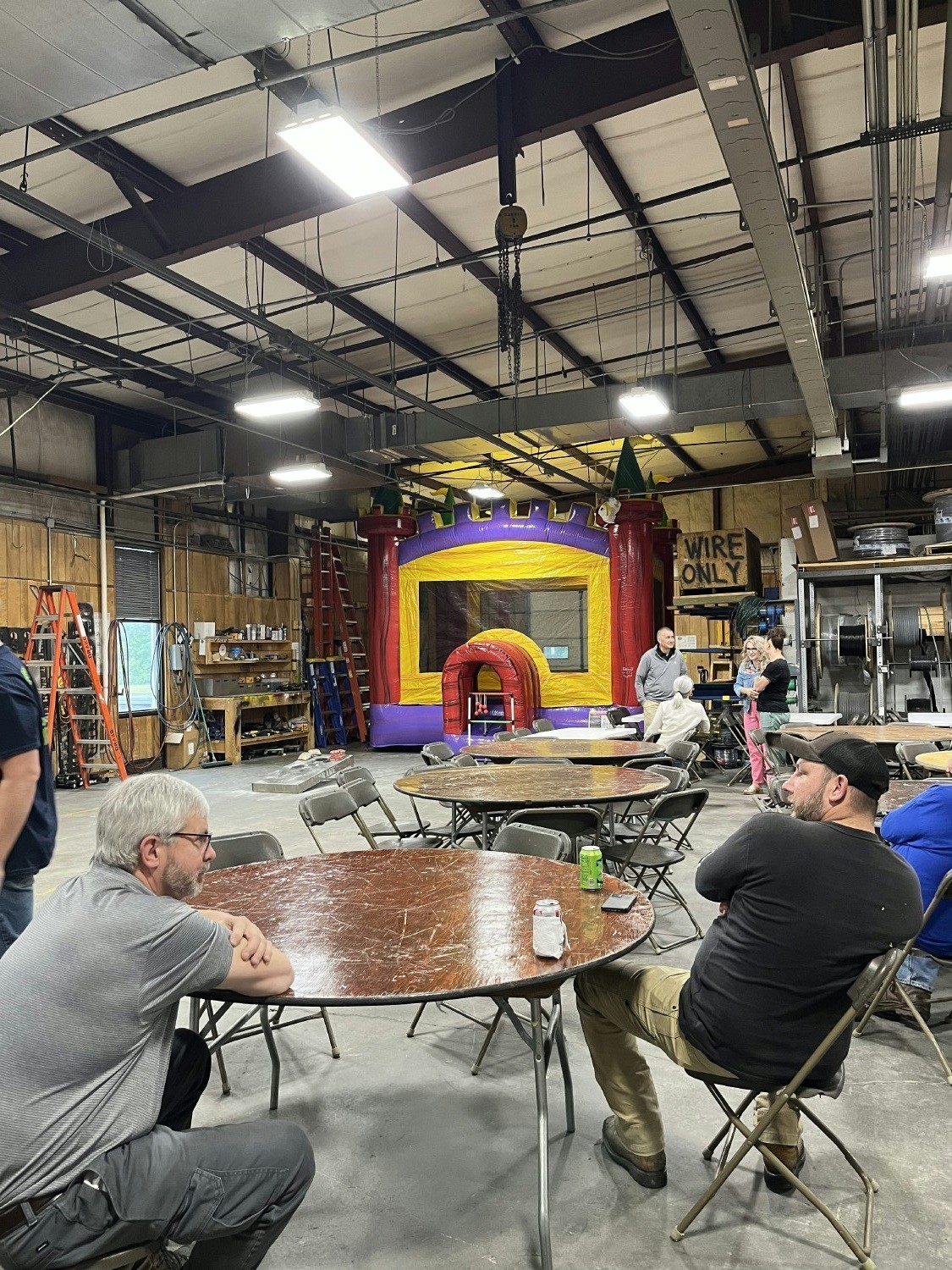 When it pours rain on company picnic day, you move it inside along with the bouncy house!