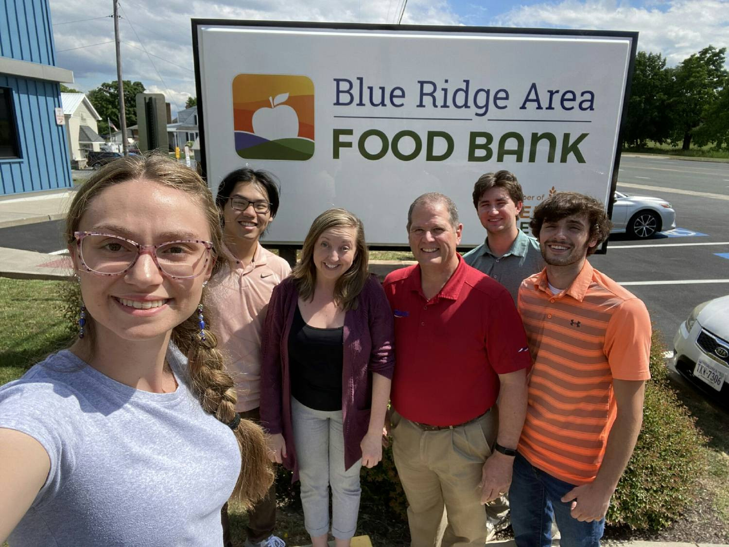 Exec. VP and Summer Interns volunteering at area food bank