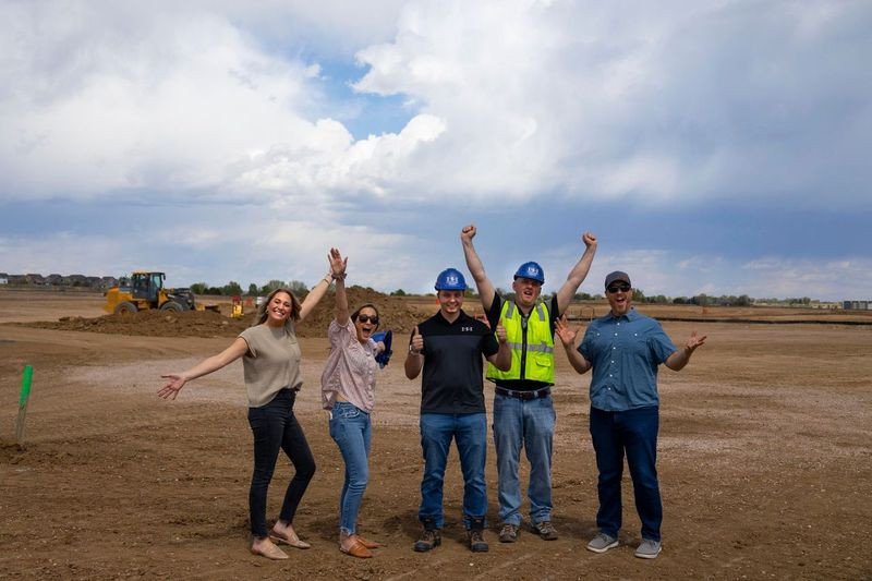 We work hard, pushing forward to the next housing project!
