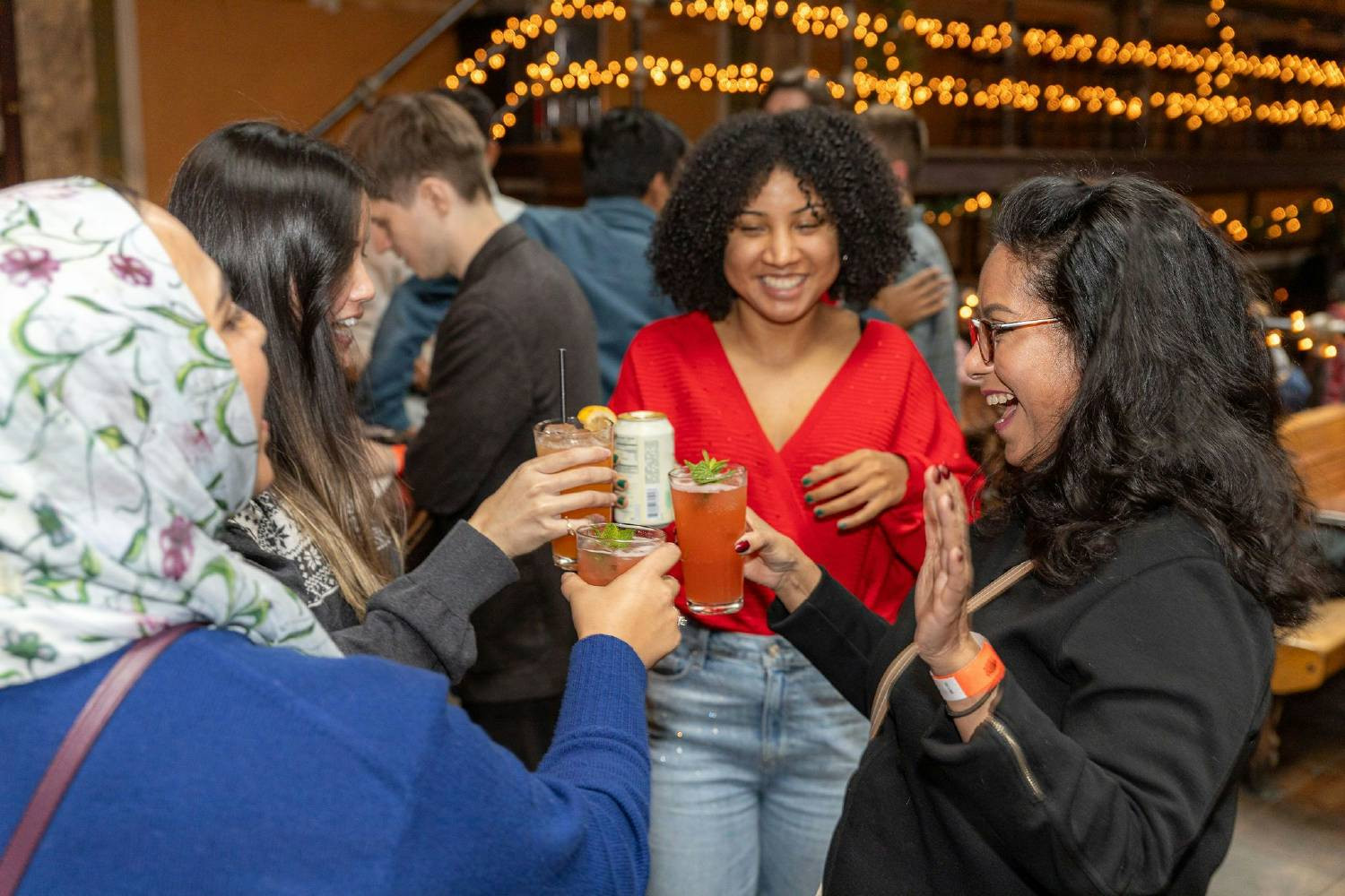 Employees cheers during our End-of-Year celebration.