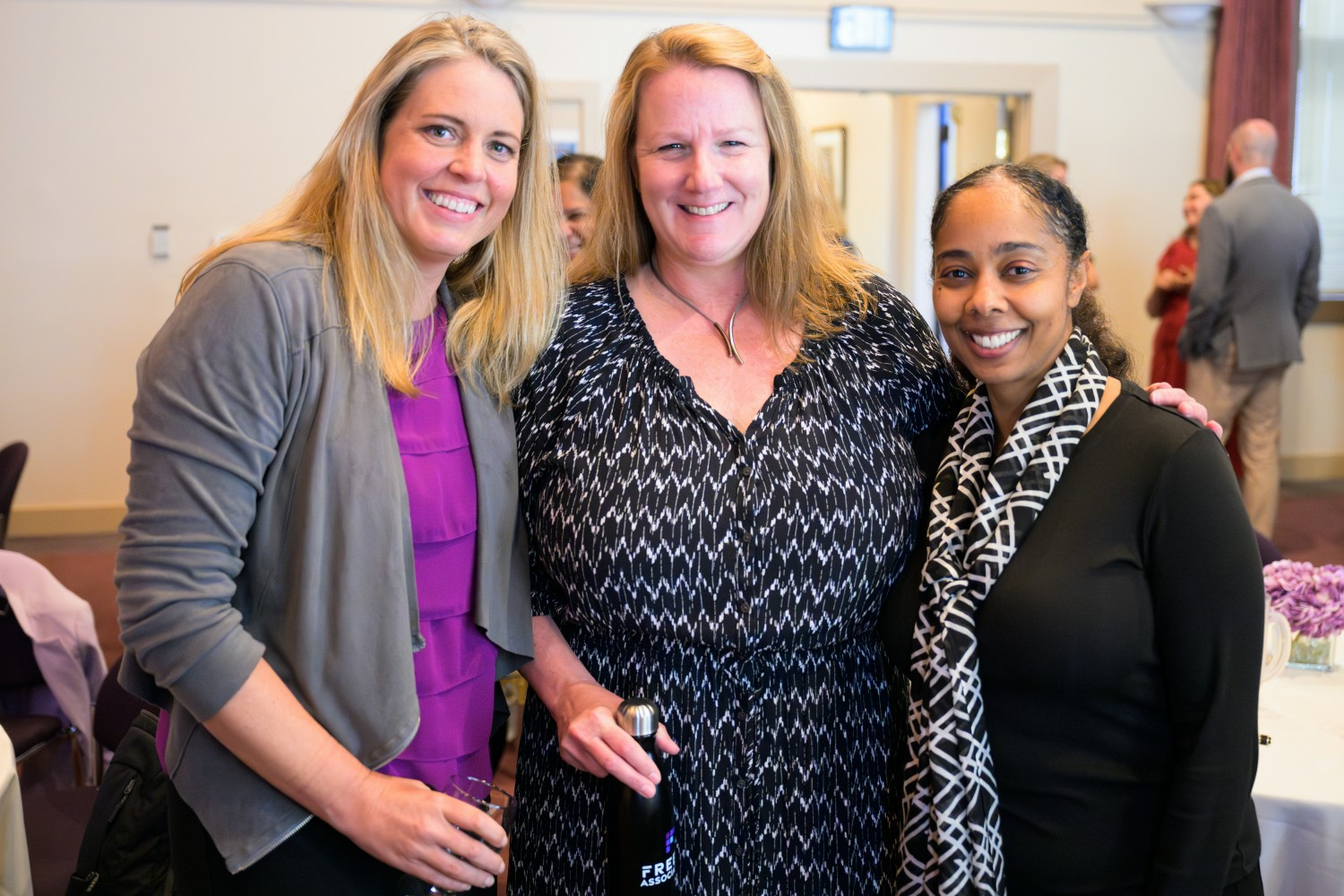 Catching up with colleagues at a company learning event.