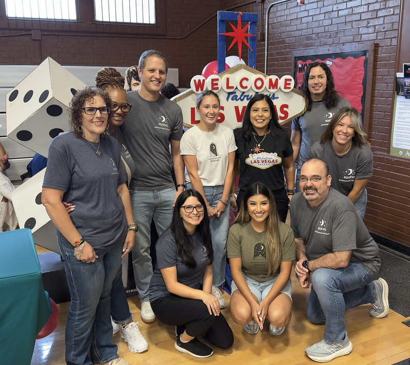 Saatva employees volunteering at Austin Pathways Senior Mayfest event for elder adults living in Austin Public Housing.