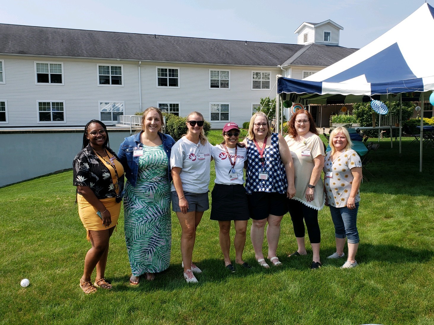 Our Dove Team welcoming employees to a Summer Picnic