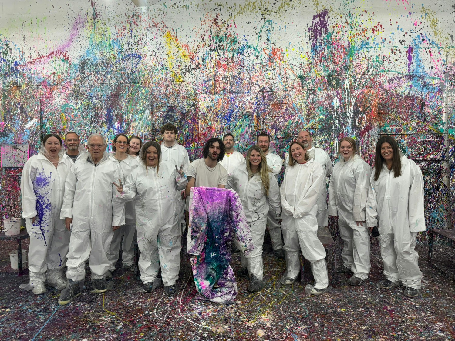 Suited up to get creative! The Bradley Team had a blast splatter painting together!