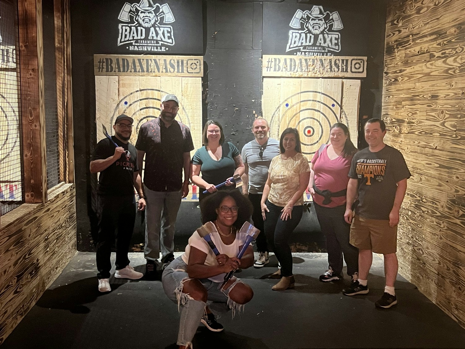 Our Professional Services team challenged each other to an ax throwing competition at our Team Night event