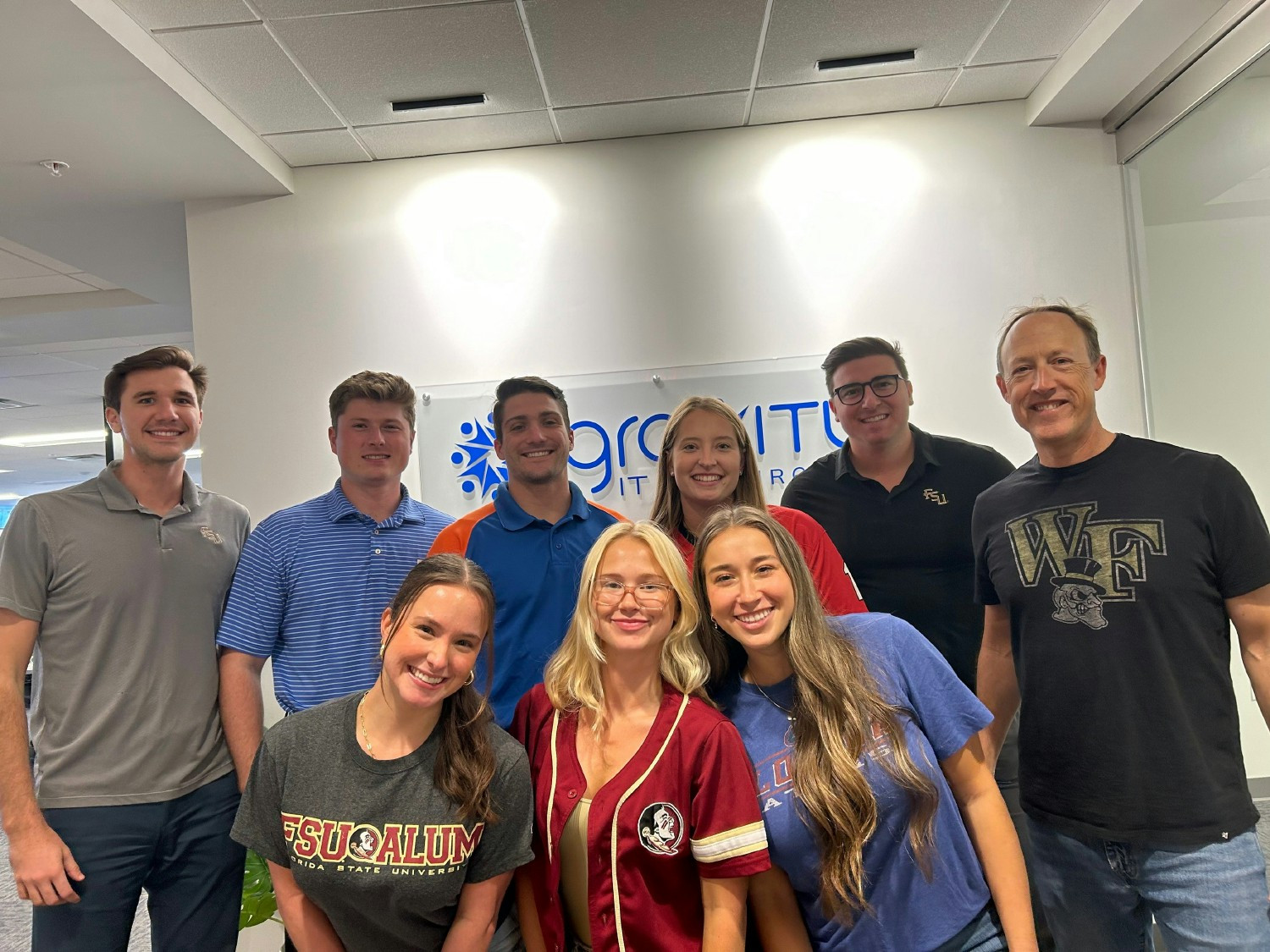 Our Fort Lauderdale team celebrating the start of College Football Season with a themed team lunch! 