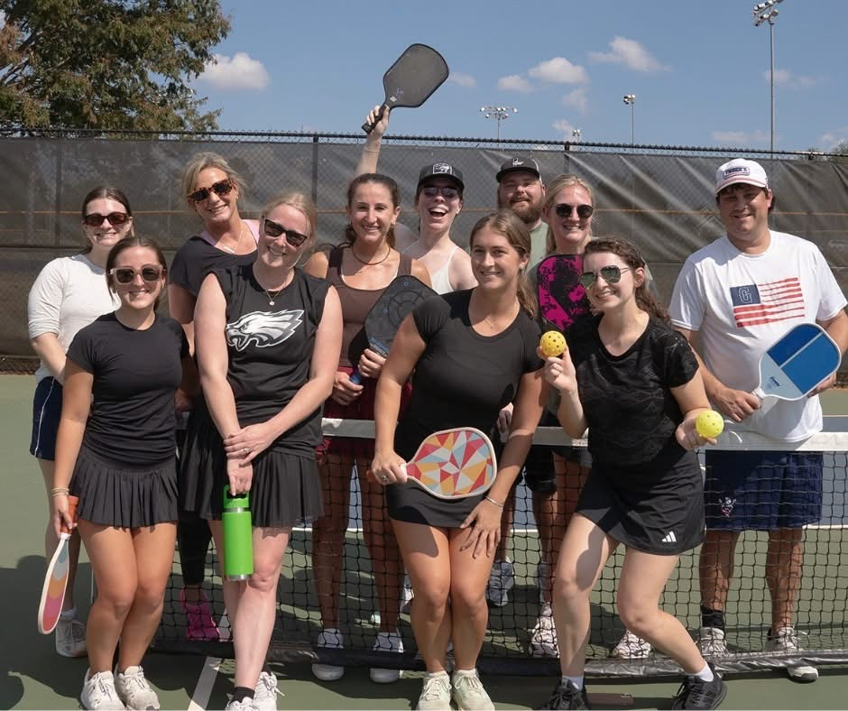 We work hard and have fun - our team pickleball tournament built connections through friendly competition.