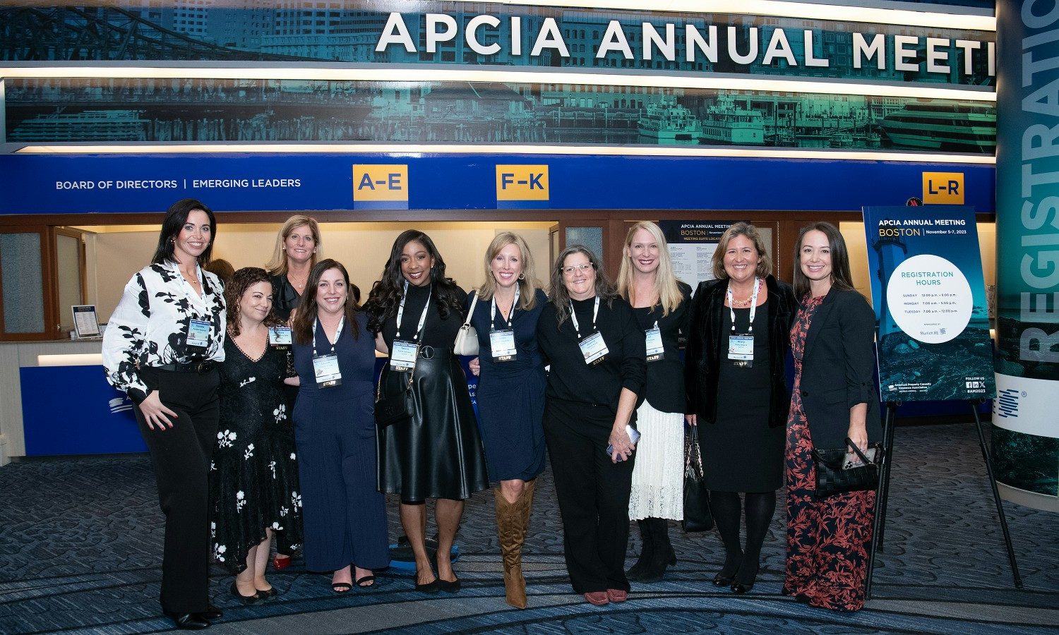 APCIA staff greeting members at the Annual Meeting in Boston, MA.
