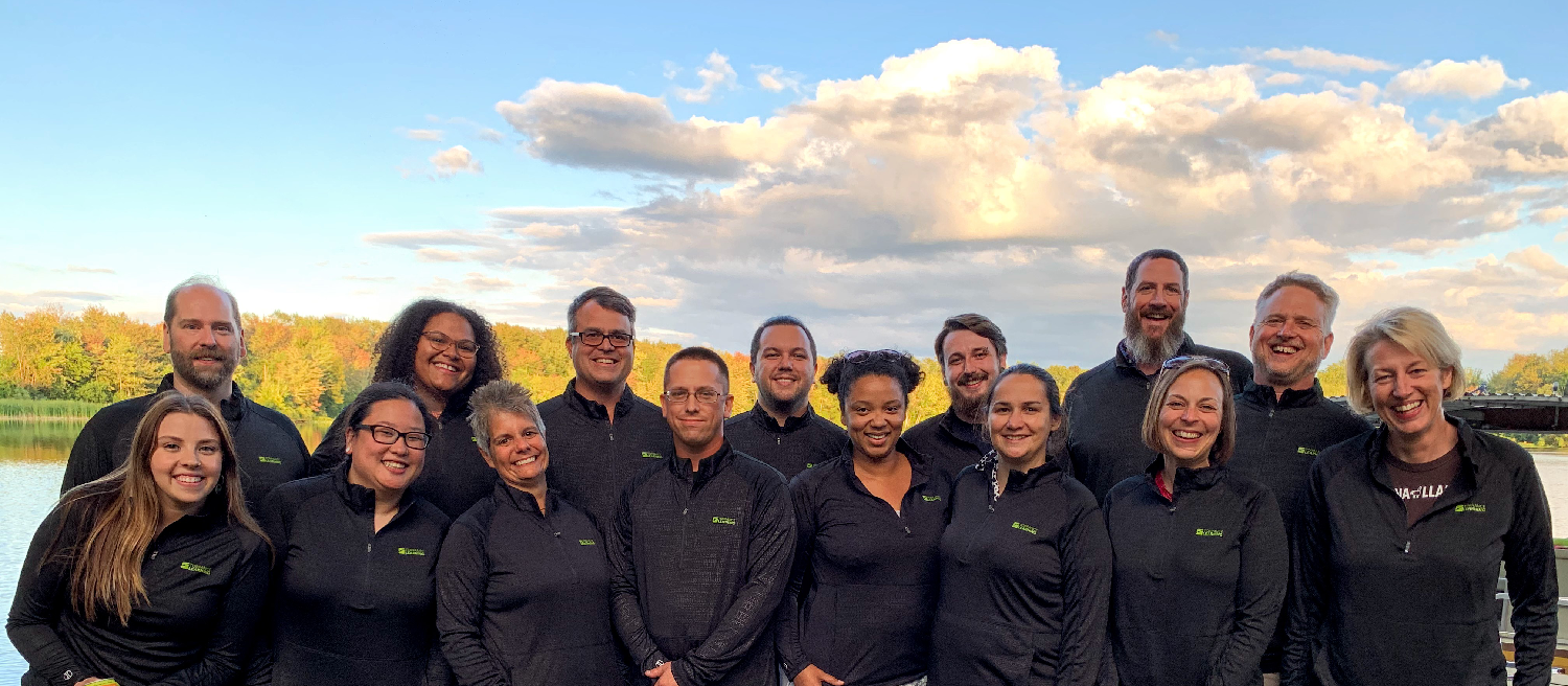 The TorranceLearning team celebrates annually with a summer picnic at a team member's lake house.