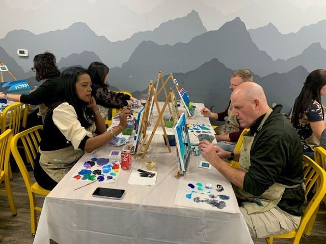 A favorite for MVB team members is gathering in person for team-building events, like this fun paint & sip event.