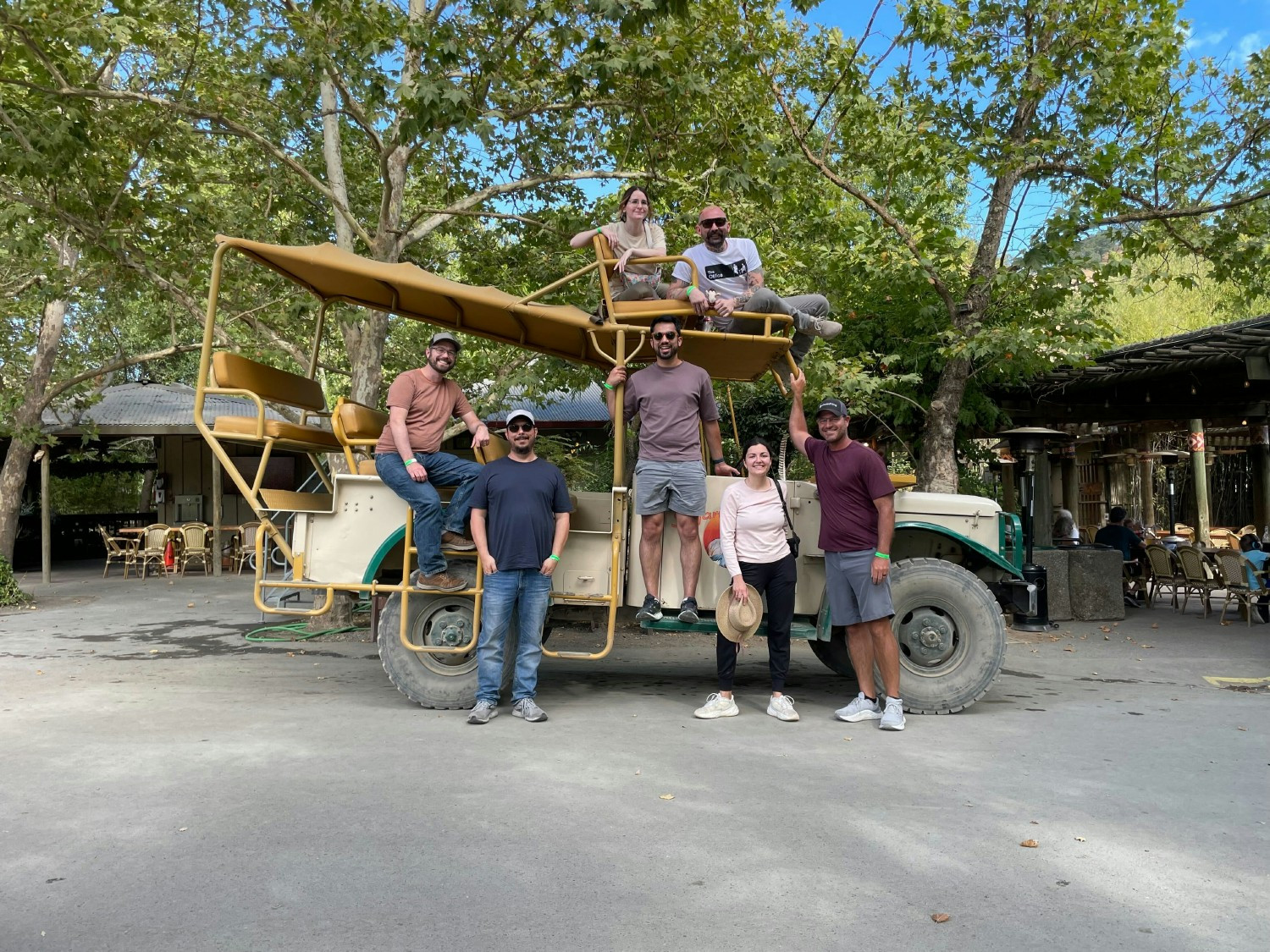 A TEAM ENJOYING A SAFARI ACTIVITY DURING THEIR OFFSITE