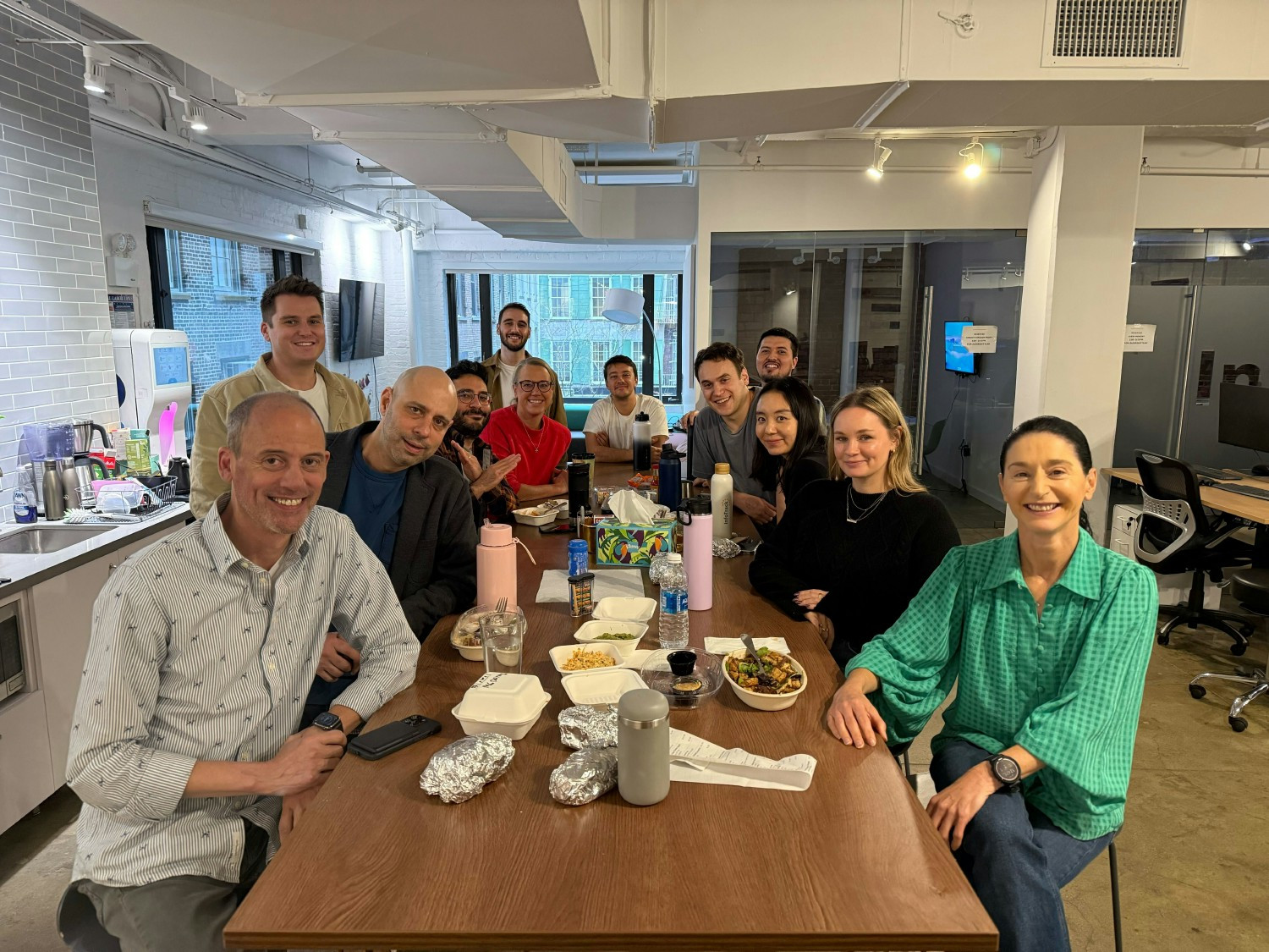 NEW YORK TEAM ENJOYING AN OFFICE LUNCH