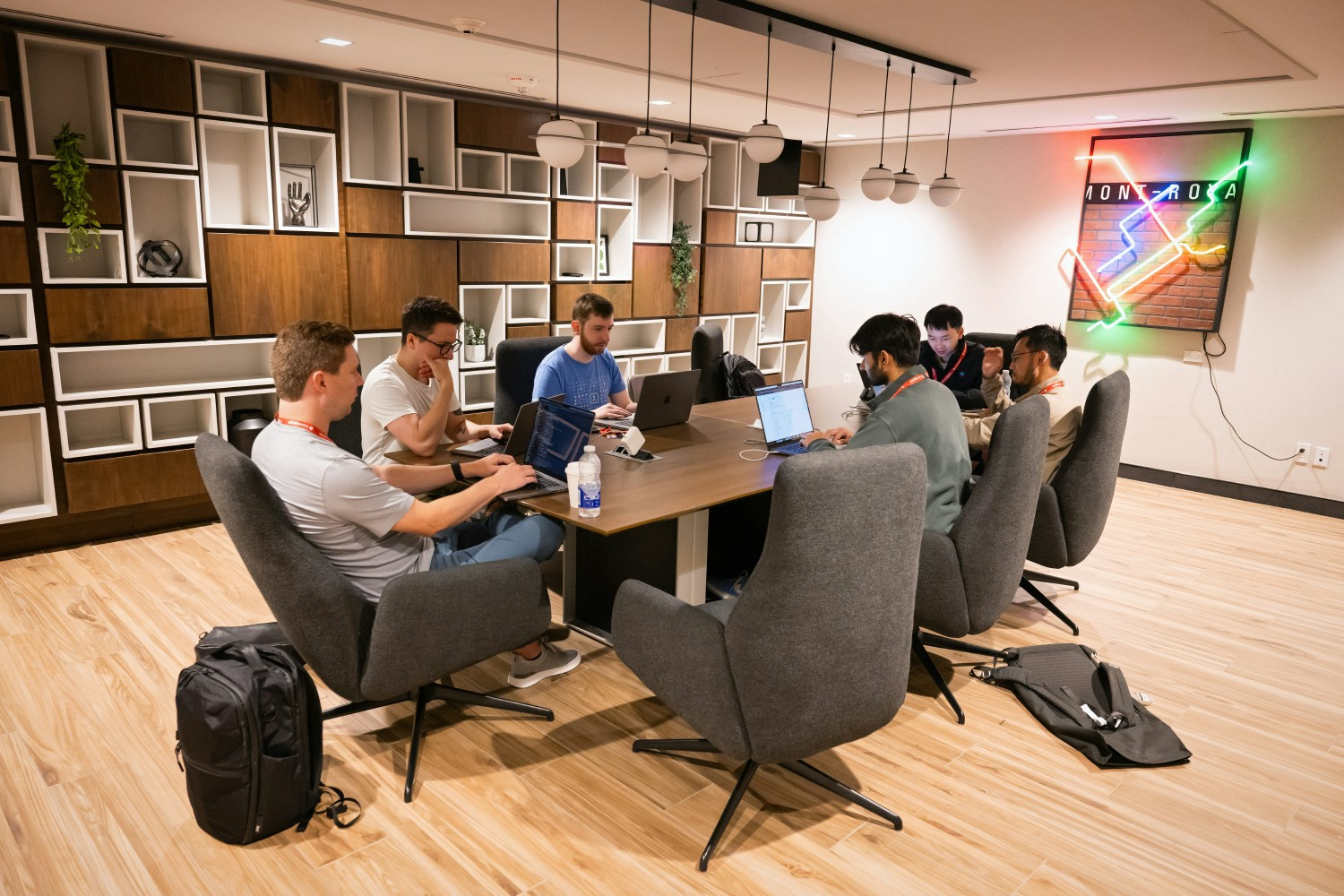 Sourcegraph teammates co-working and collaborating.