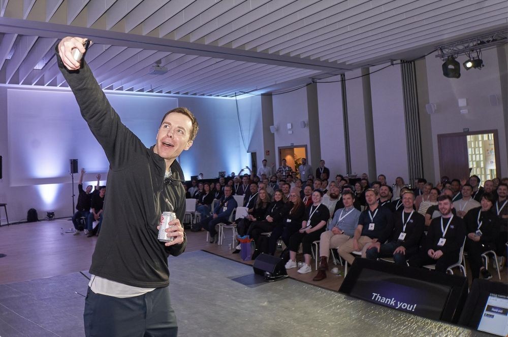CEO, Quinn Slack, takes company selfie at 2023 Barcelona company offsite