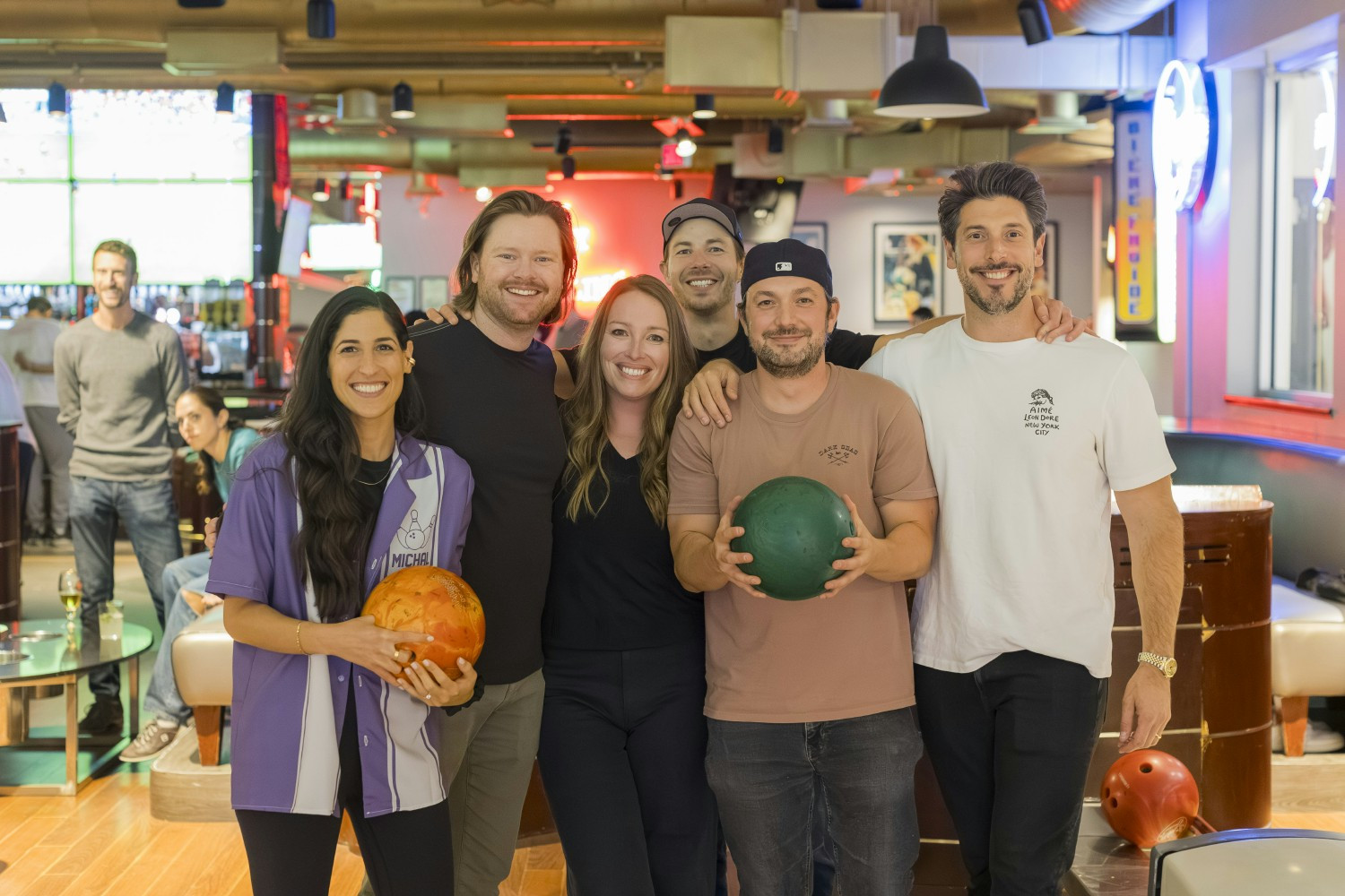 Sourcegraph teammates at a company bowling event.