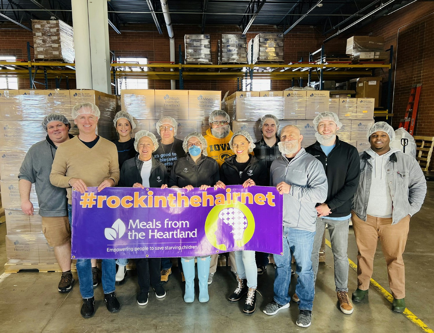 Growers Edge team members at local non-profit organization, Meals from the Heartland, for annual Volunteer Day!