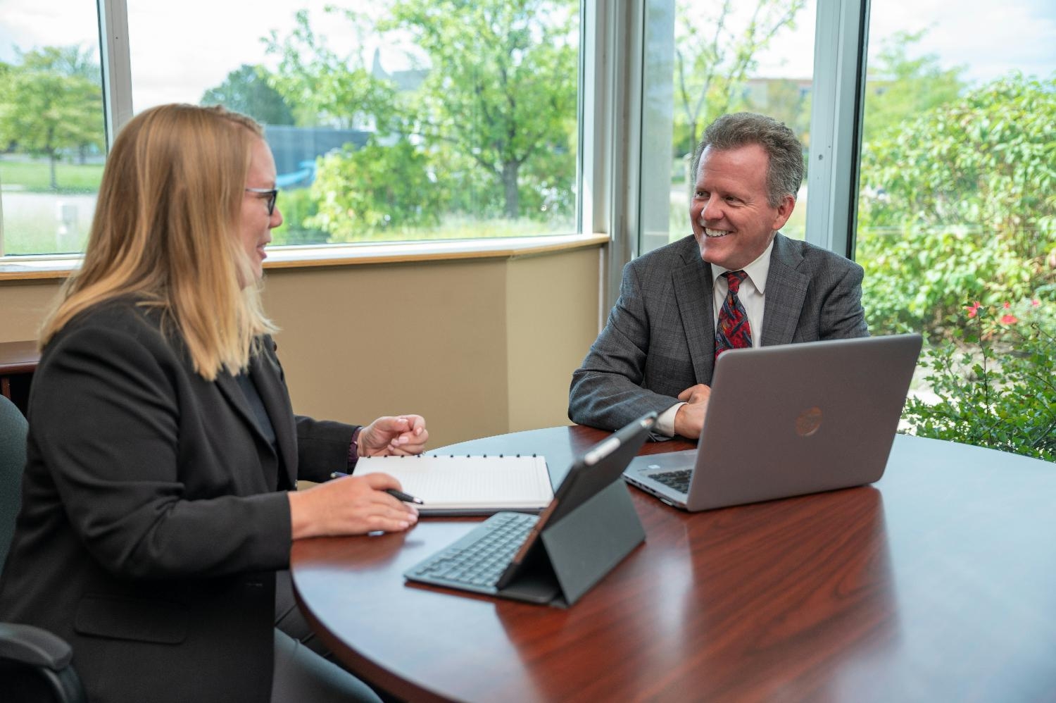 Chief Financial Officer, Laura Juarez meets with Geoff Thursby in the  Envista headquarters located in Deerfield, IL