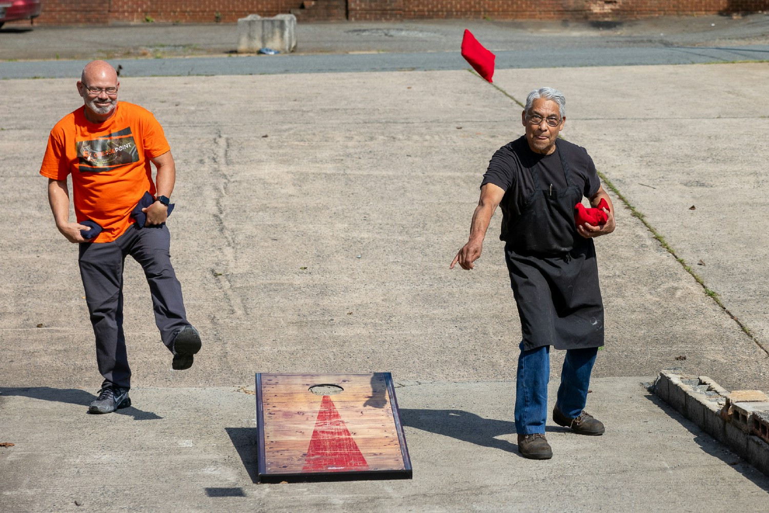 Preliminary match at our Greasepoint brand in Charlotte for our annual cornhole tournament.