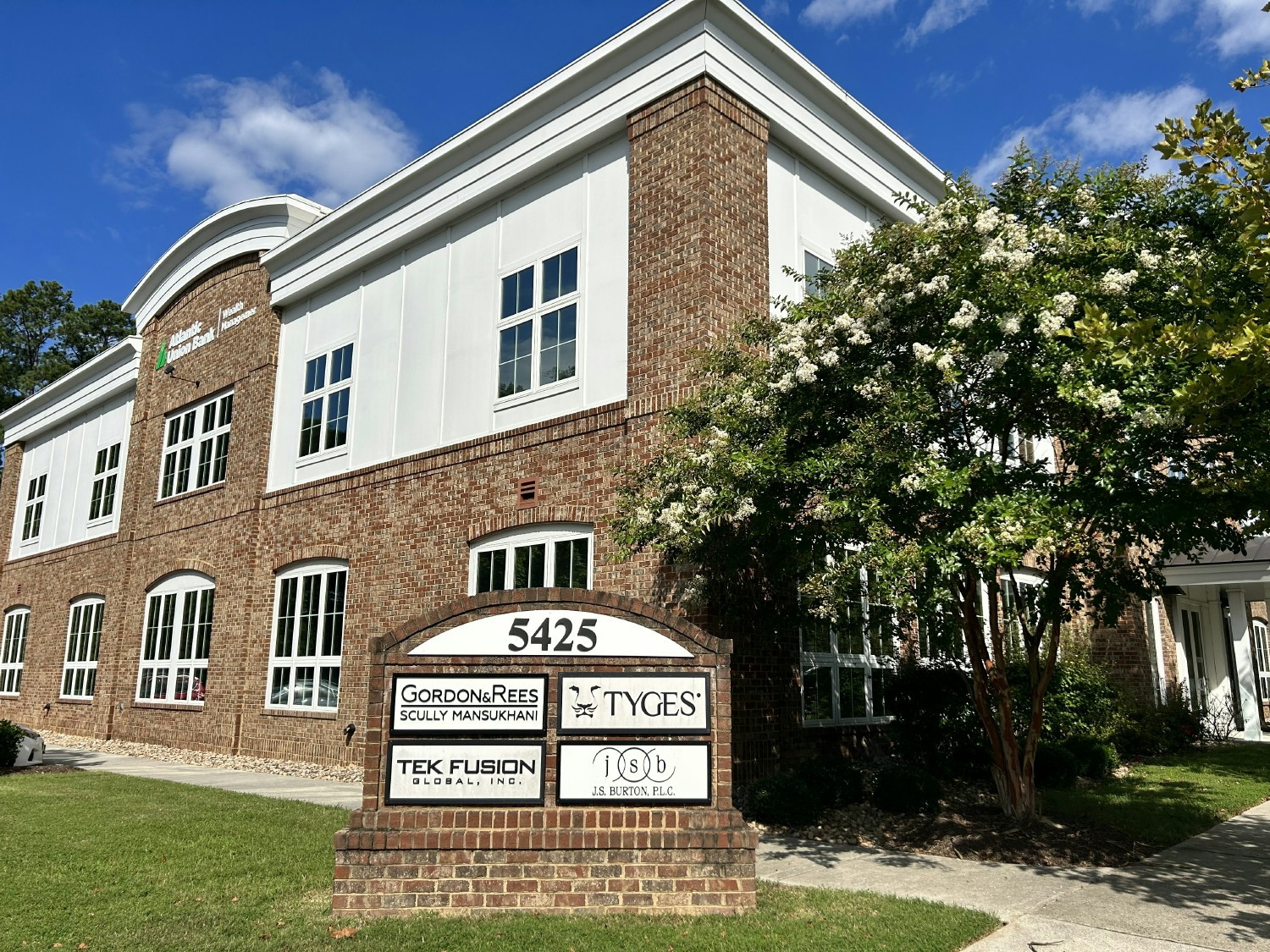 TYGES team members in Jacksonville, FL office.