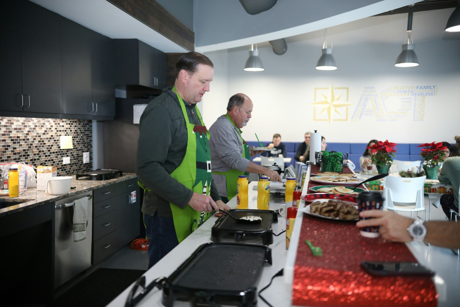 AOT celebrates an annual Pancake Breakfast in December. Senior leaders prepare breakfast for the whole team to enjoy!