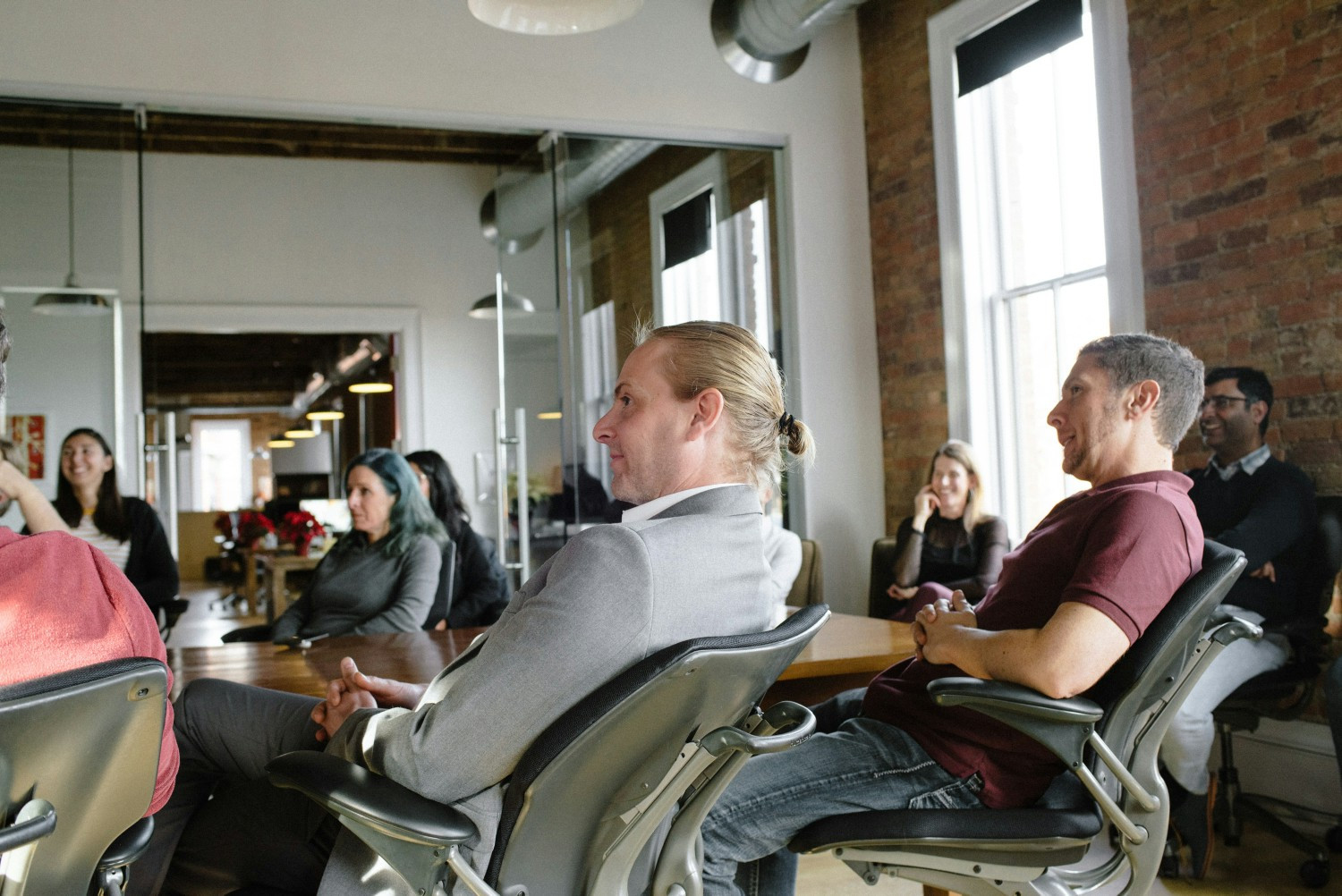 The InspiringApps team gathers regularly for company meetings to discuss innovation, artificial intelligence and more.