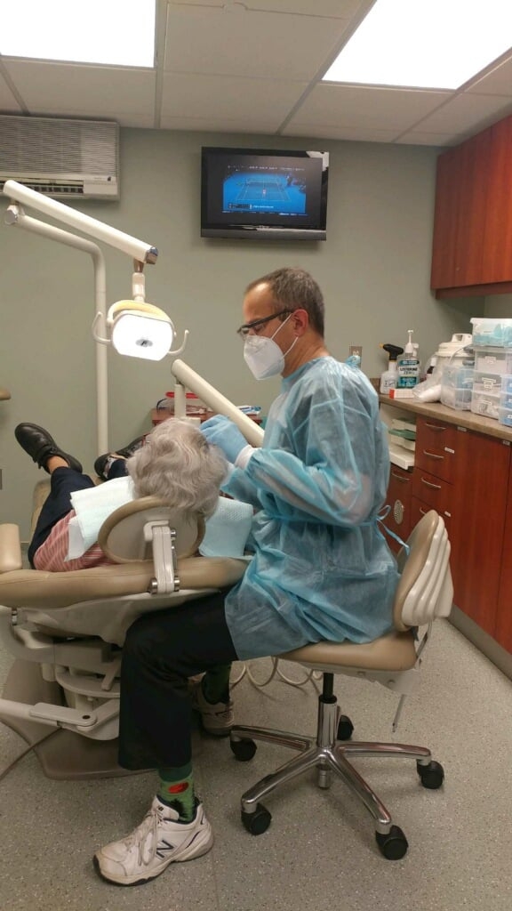 Dr. Lehman in action, treating one of our patients.