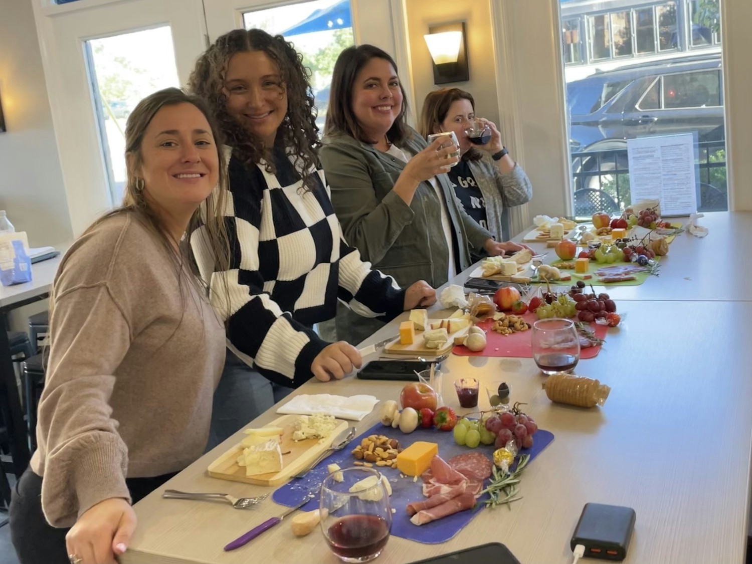 The Accounts Team gathers for a bonding activity and learns to make charcuterie boards.