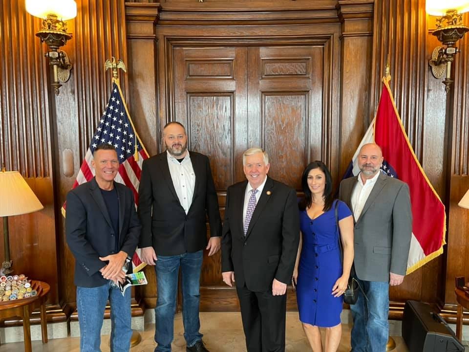 Woods Supermarket VPs meet with Gov Mike Parson