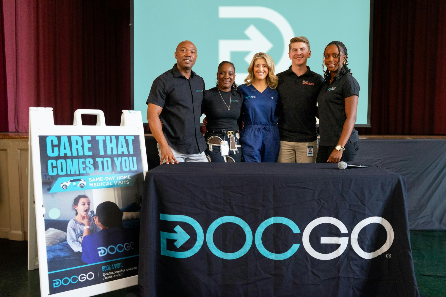 DocGo volunteers at a local school to teach sexual education. 