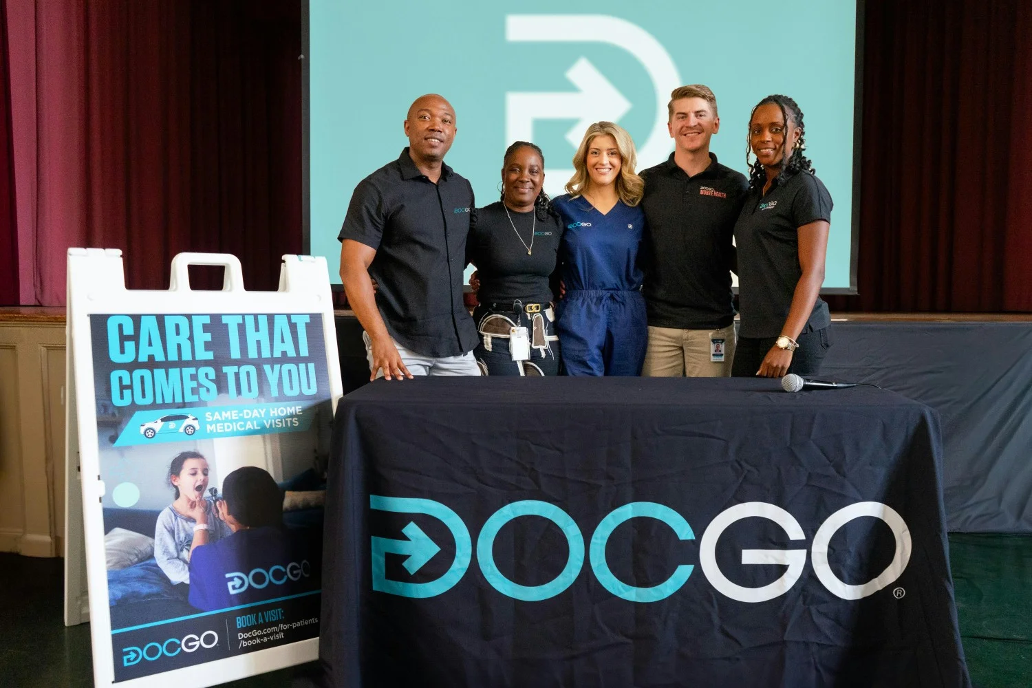 DocGo volunteers at a local school to teach sexual education. 