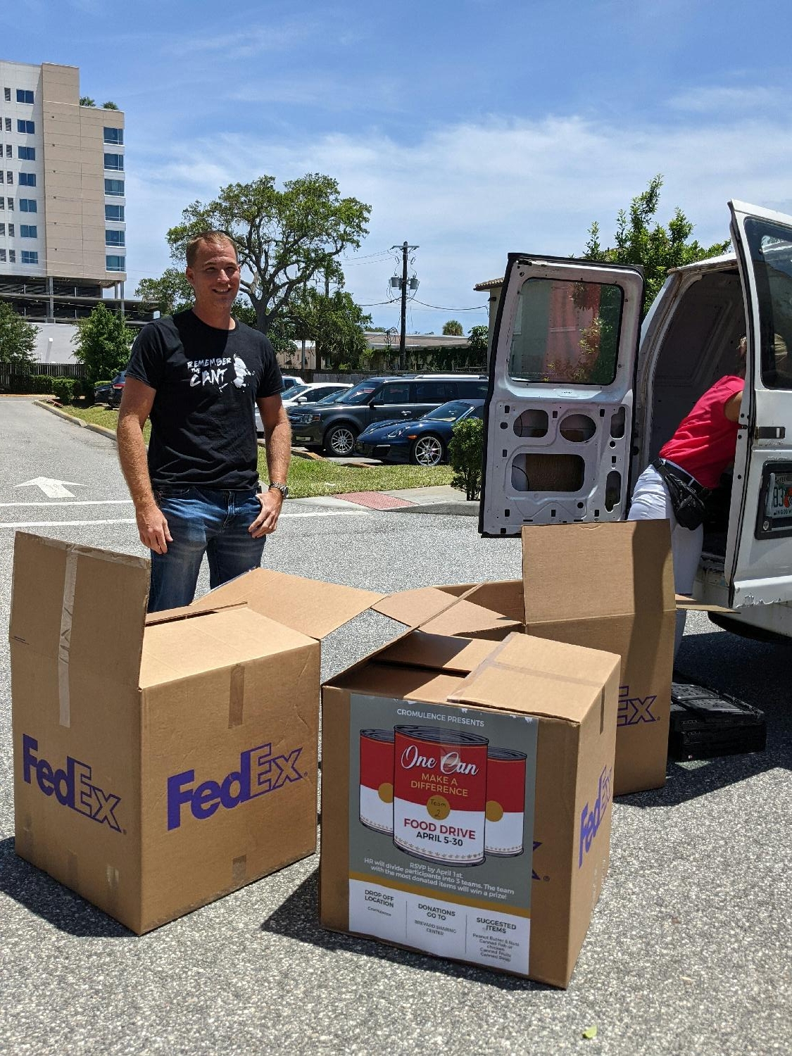 CEO helping with Community Food Drive