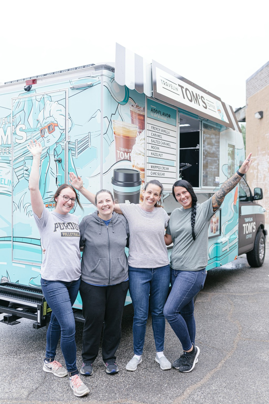 Party and Engagement Planning Committee members celebrating that a food truck came to provide everyone with lunch.