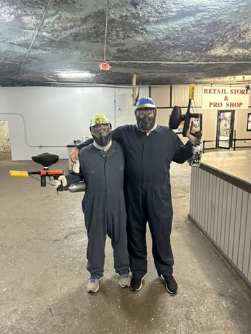 Ryan and Chase Playing paintball in a cave after a long conference !