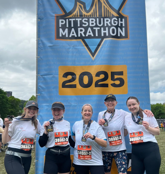OW team members participating in the Pittsburgh Marathon as a relay team