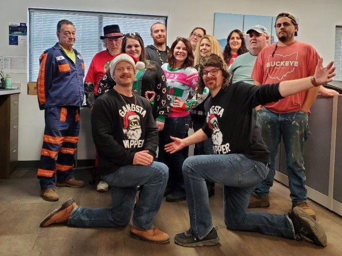 ContainerPort Group employees get into the Christmas spirit with a dress-up day at their facility - December, 2021.