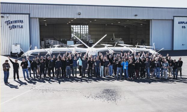 Several members of Archer’s engineering team celebrate a recent flight test milestone together. 
