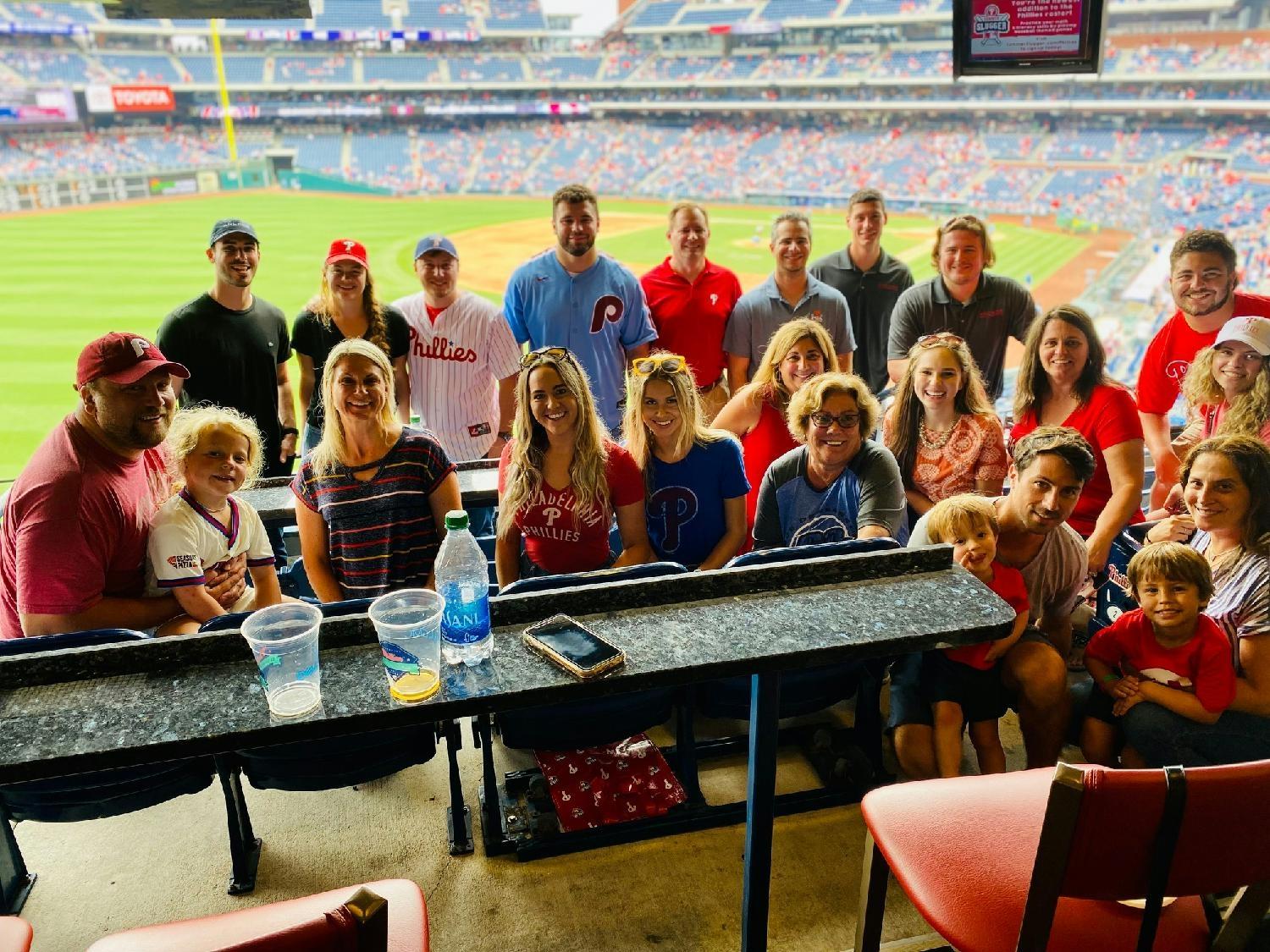 James Schmid, Chief Investment Officer & Managing Partner, and the team enjoying a Phillies verses Nationals game.