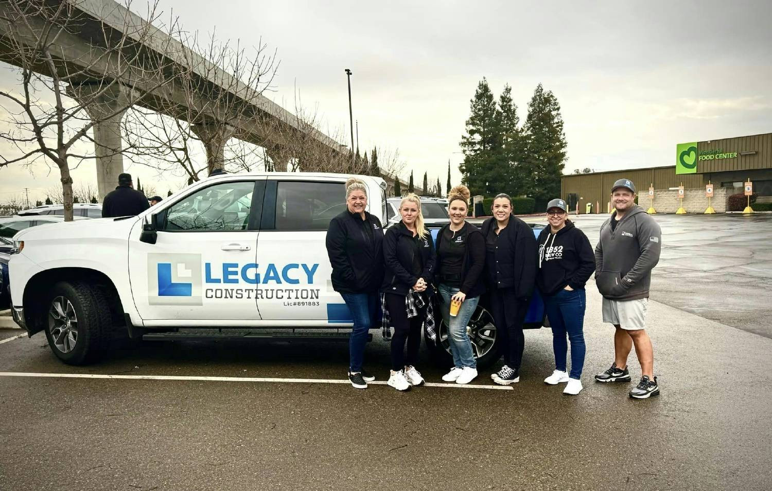 The community committee before working to pack food boxes at the local Food Bank that services 5 surrounding counties. 