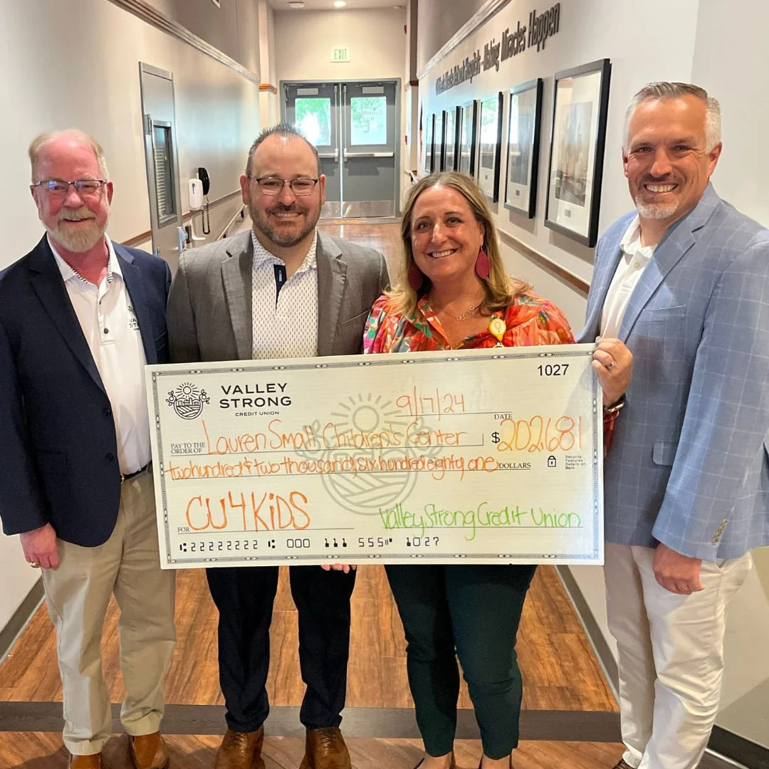 Valley Strong Leaders presenting a check to Lauren Small Children’s Center